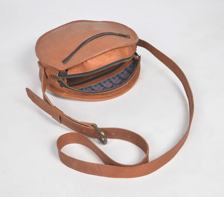 Camel-Toned Punch Work Kutch Leather Round Sling Bag